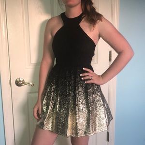 B. Darlin halter gold and black lace dress